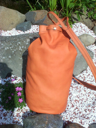 tan daysack leather bag